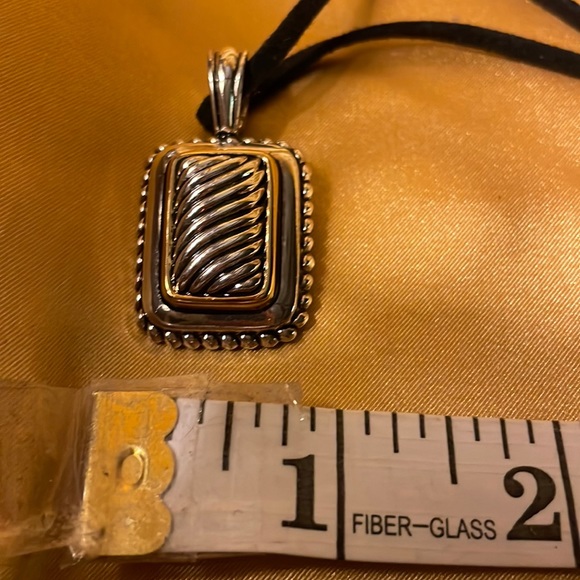 Gold and silver colored pendant on leather like cord strap - Picture 12 of 12